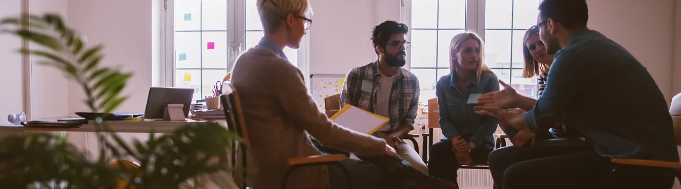 The RECO Island team gathered together at the treatment facility